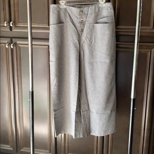 Grey. Never worn. W 17”, hip 24”. & length 38”